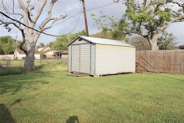 view of outdoor structure with a yard