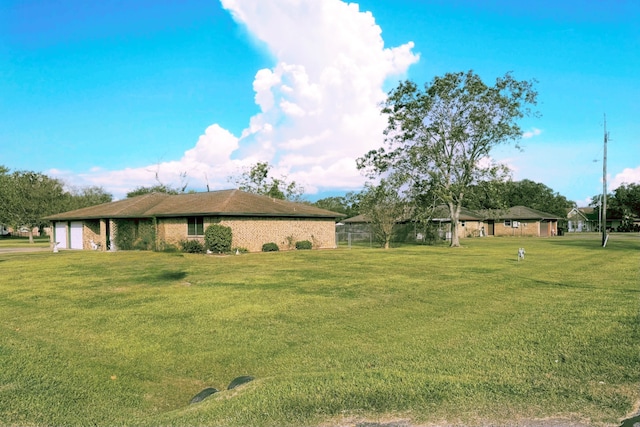 exterior space with a front yard