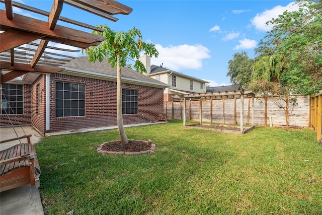 view of yard featuring a patio area and a pergola