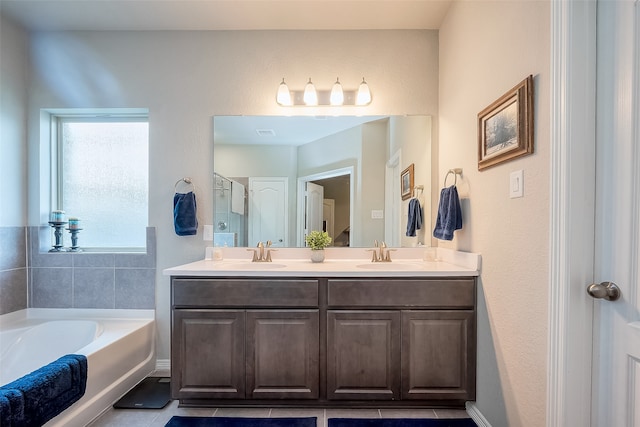 bathroom with vanity, independent shower and bath, and tile patterned floors