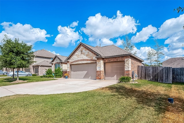 view of front facade with a front lawn and a garage