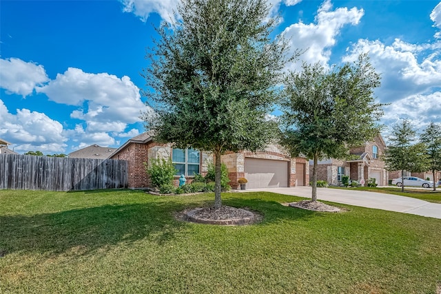 view of front of property featuring a front lawn and a garage