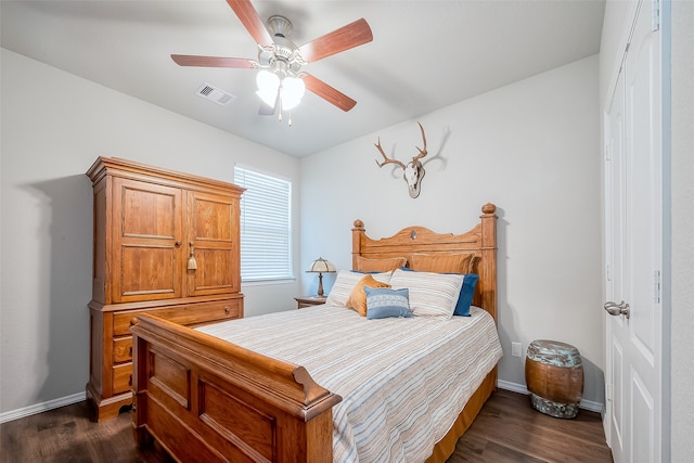 bedroom featuring dark wood-type flooring and ceiling fan