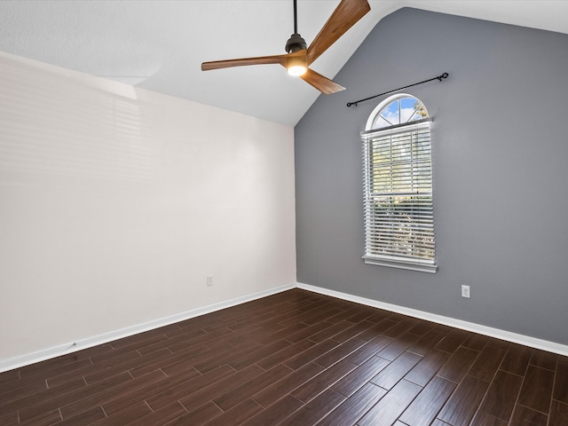 unfurnished room featuring vaulted ceiling, ceiling fan, and dark hardwood / wood-style flooring