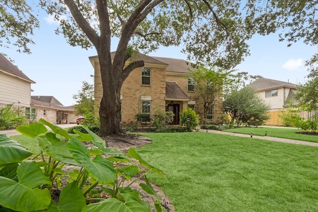 view of front facade with a front lawn