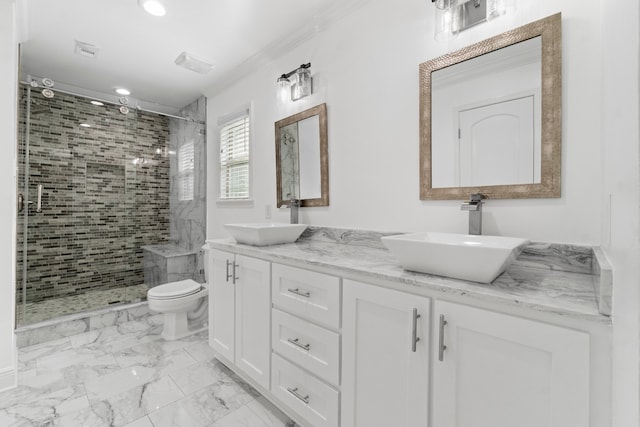 bathroom with vanity, crown molding, toilet, and walk in shower