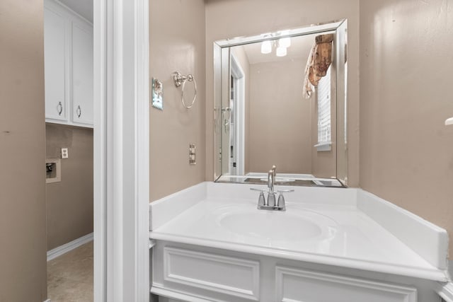 bathroom with vanity and tile patterned flooring