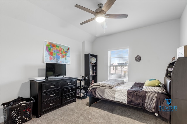 carpeted bedroom with lofted ceiling and ceiling fan