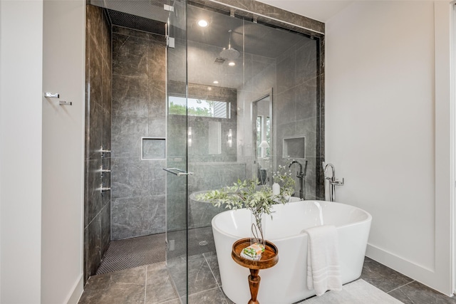 bathroom with tile patterned flooring and plus walk in shower