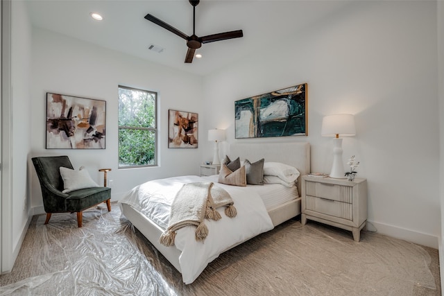 carpeted bedroom featuring ceiling fan