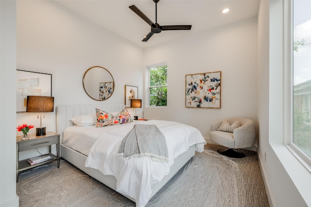 carpeted bedroom with ceiling fan