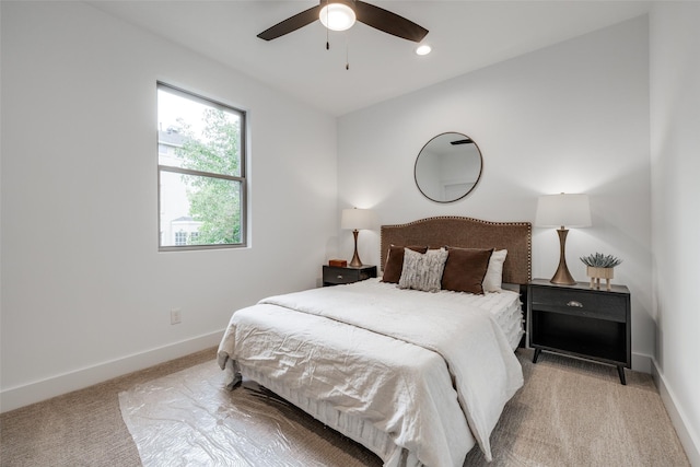 carpeted bedroom with recessed lighting, baseboards, and a ceiling fan