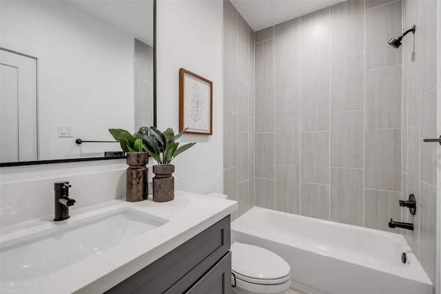 full bath featuring toilet, shower / washtub combination, and vanity