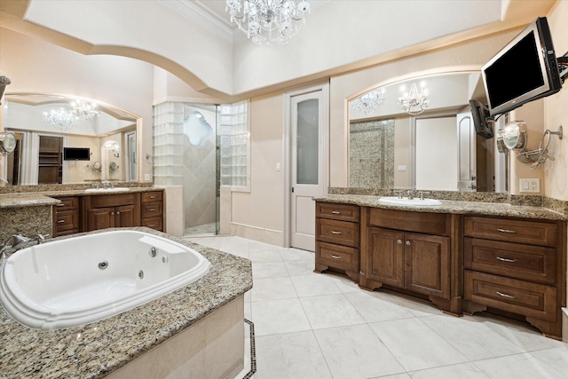 bathroom with separate shower and tub, vanity, an inviting chandelier, and crown molding