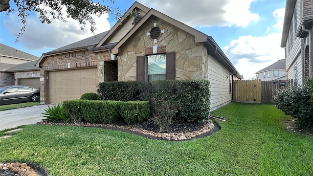 view of front facade with a front lawn and a garage