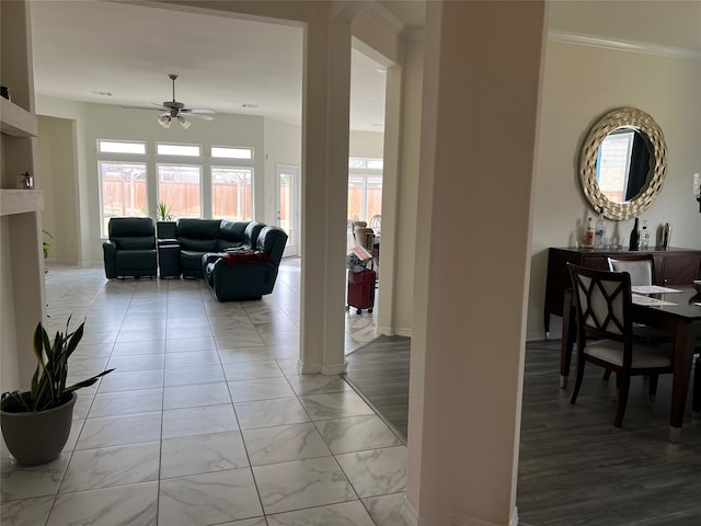 hall featuring light wood-type flooring and crown molding