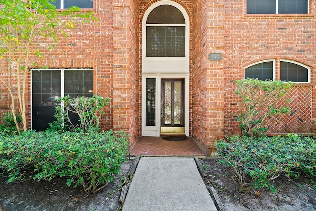 entrance to property with a patio area