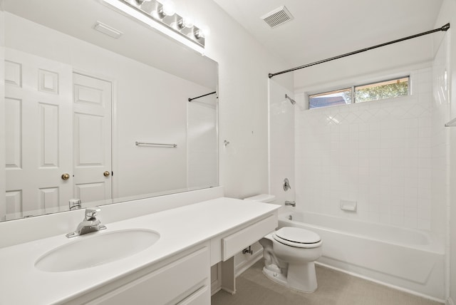 full bathroom featuring vanity, toilet, and tiled shower / bath combo