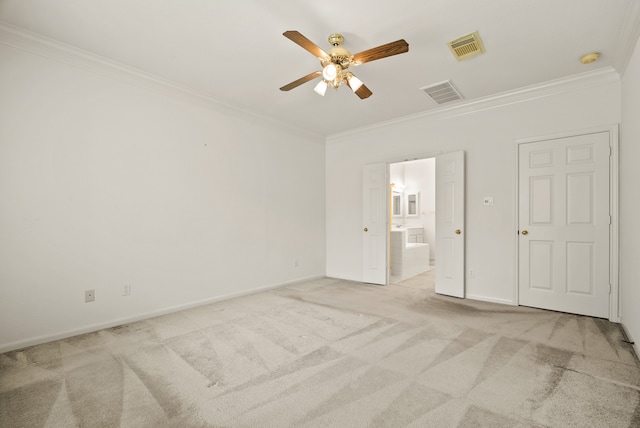 unfurnished room featuring light carpet, crown molding, and ceiling fan