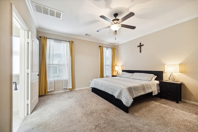 carpeted bedroom with crown molding and ceiling fan