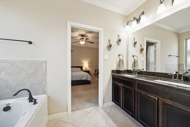 bathroom featuring vanity, crown molding, a tub to relax in, and tile patterned floors