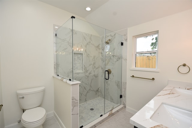 bathroom with a shower with door, sink, toilet, and tile patterned flooring