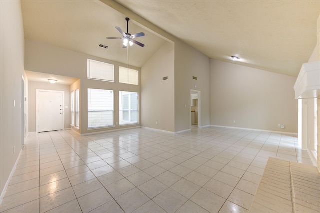 unfurnished living room with beamed ceiling, light tile patterned floors, high vaulted ceiling, and ceiling fan