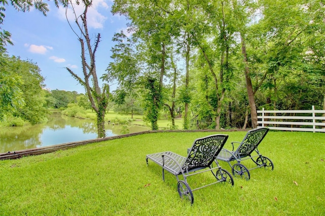 view of yard with a water view