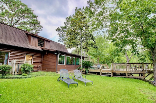 view of yard with a deck