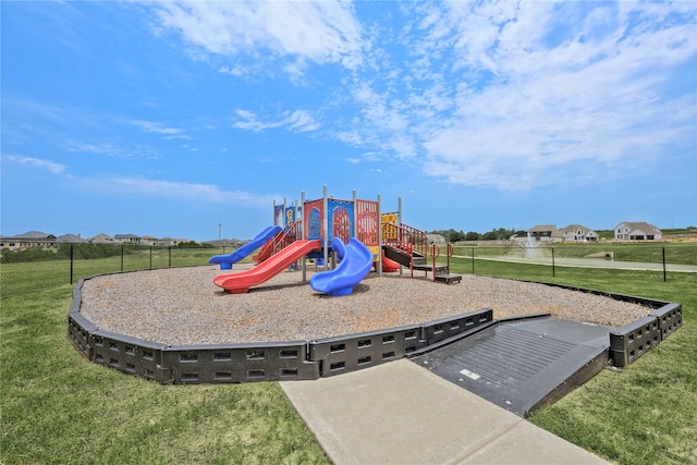 view of jungle gym featuring a yard