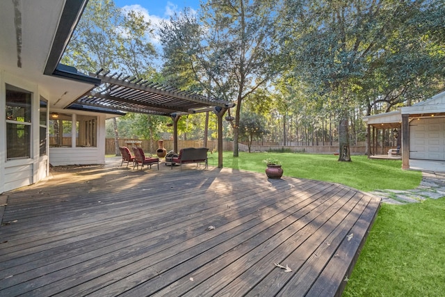 deck featuring a pergola, a lawn, and an outdoor living space