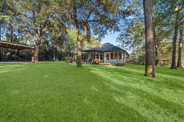 view of yard with a carport