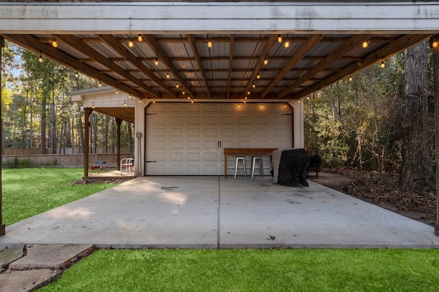 garage with a lawn