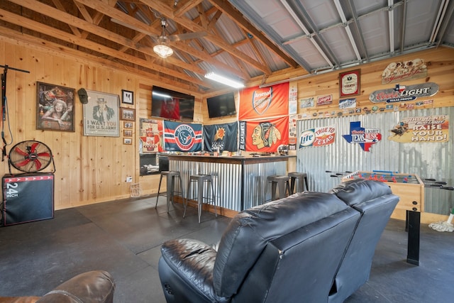 interior space featuring wood walls and bar