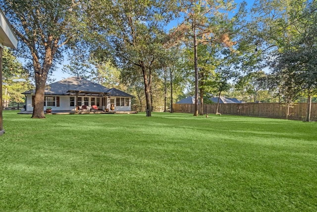 view of yard featuring a deck