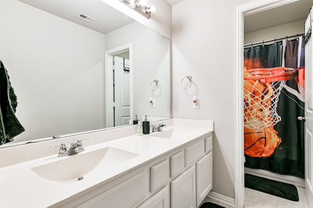 bathroom featuring vanity and tile patterned floors