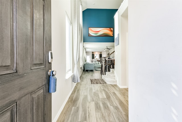 corridor featuring light wood-type flooring