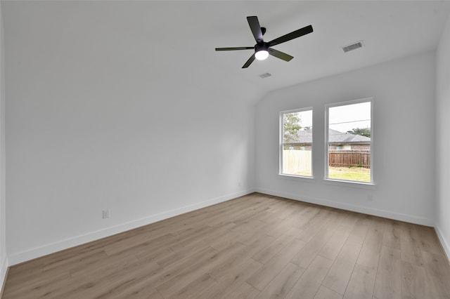 spare room with light hardwood / wood-style floors and ceiling fan