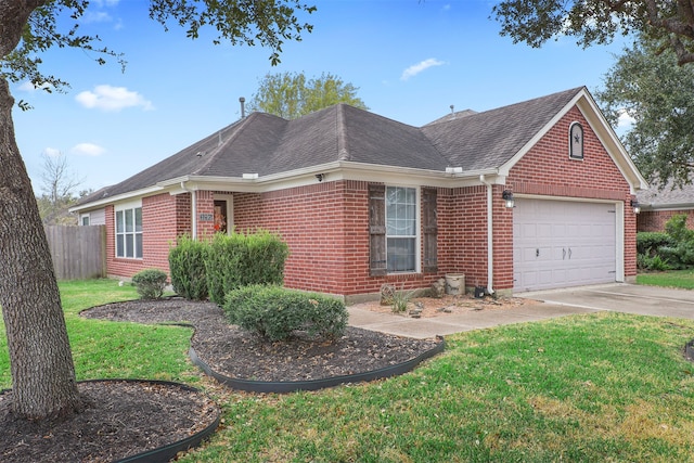 single story home featuring a garage and a front lawn