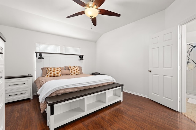 bedroom featuring lofted ceiling, dark hardwood / wood-style floors, and ceiling fan