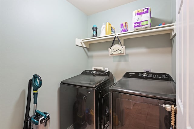 washroom featuring washer and dryer