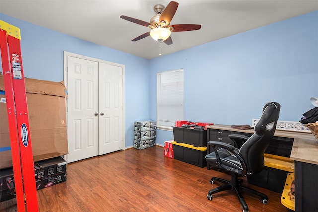 office space with ceiling fan and dark hardwood / wood-style flooring