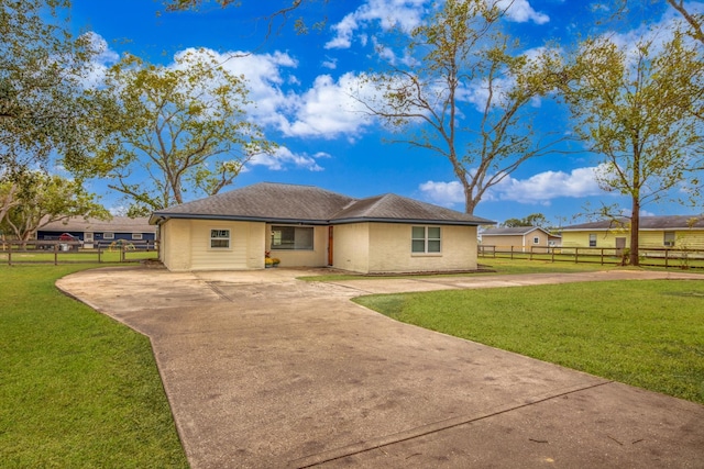 ranch-style house with a front yard