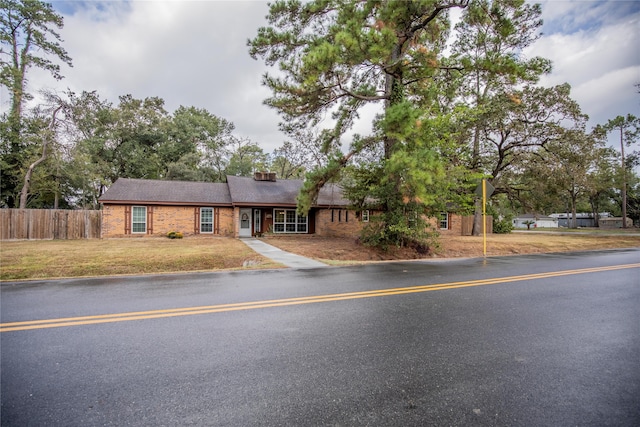 view of front of property with a front lawn