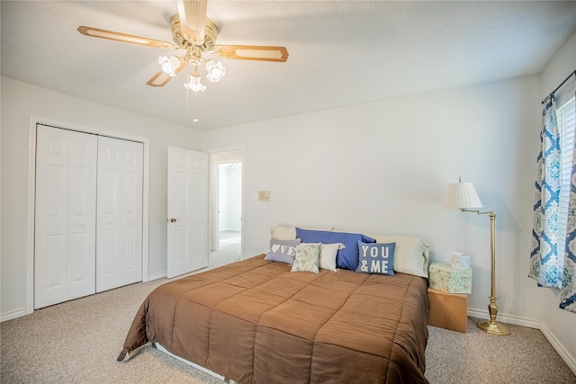 bedroom featuring carpet floors, a closet, and ceiling fan