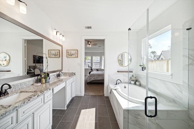 bathroom with vanity, plus walk in shower, tile patterned floors, and ceiling fan