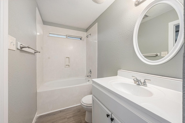 full bathroom featuring vanity, toilet, shower / bath combination, and wood-type flooring