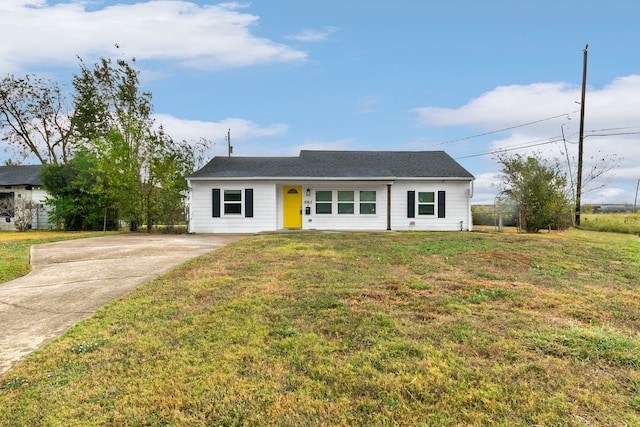 view of front of home with a front yard