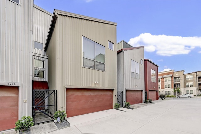 exterior space featuring a garage and elevator