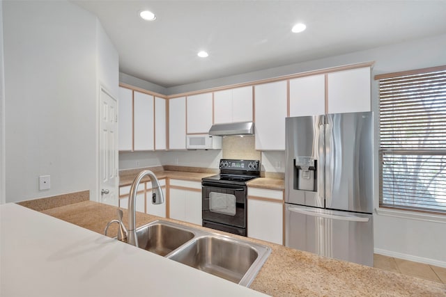 kitchen with black / electric stove, white cabinetry, light tile patterned floors, and stainless steel refrigerator with ice dispenser